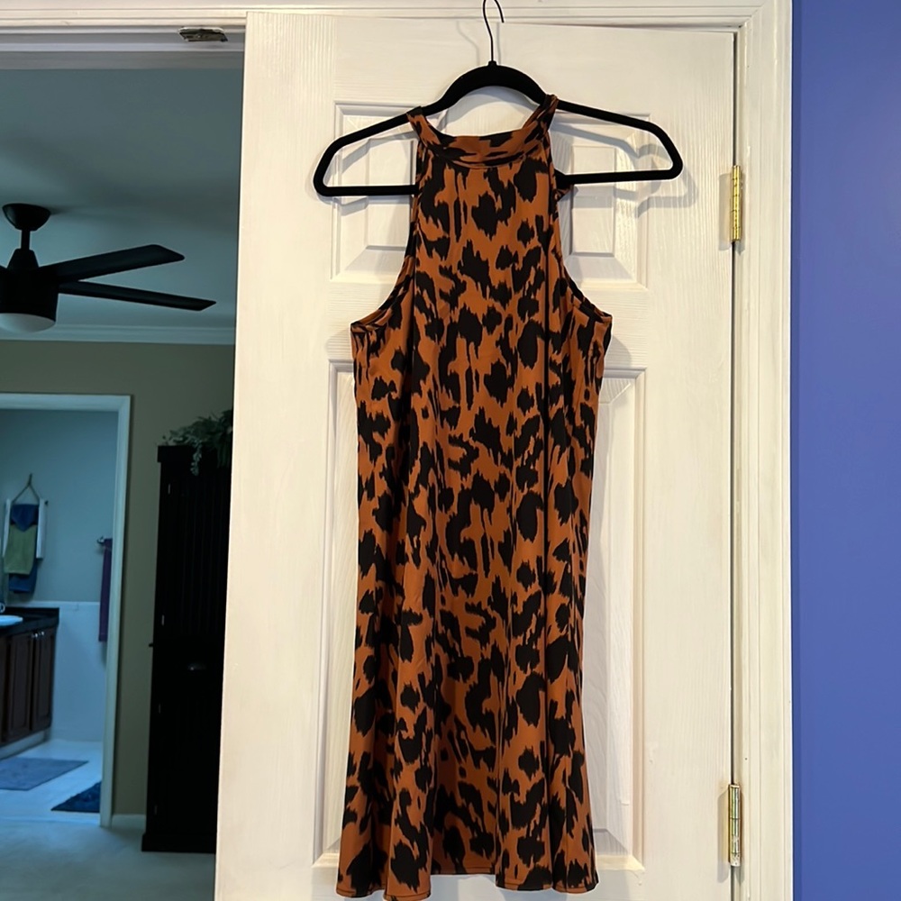 Cute sundress for spring!!!  Never worn. I’m petite so too long for my liking